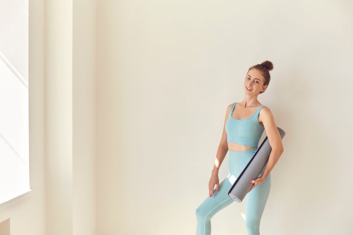 Pilates al muro per tonificare i glutei